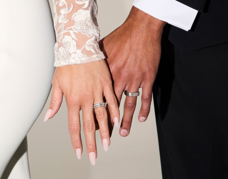 Forever Diamond Engagement Ring with a red ribbon through the ring 