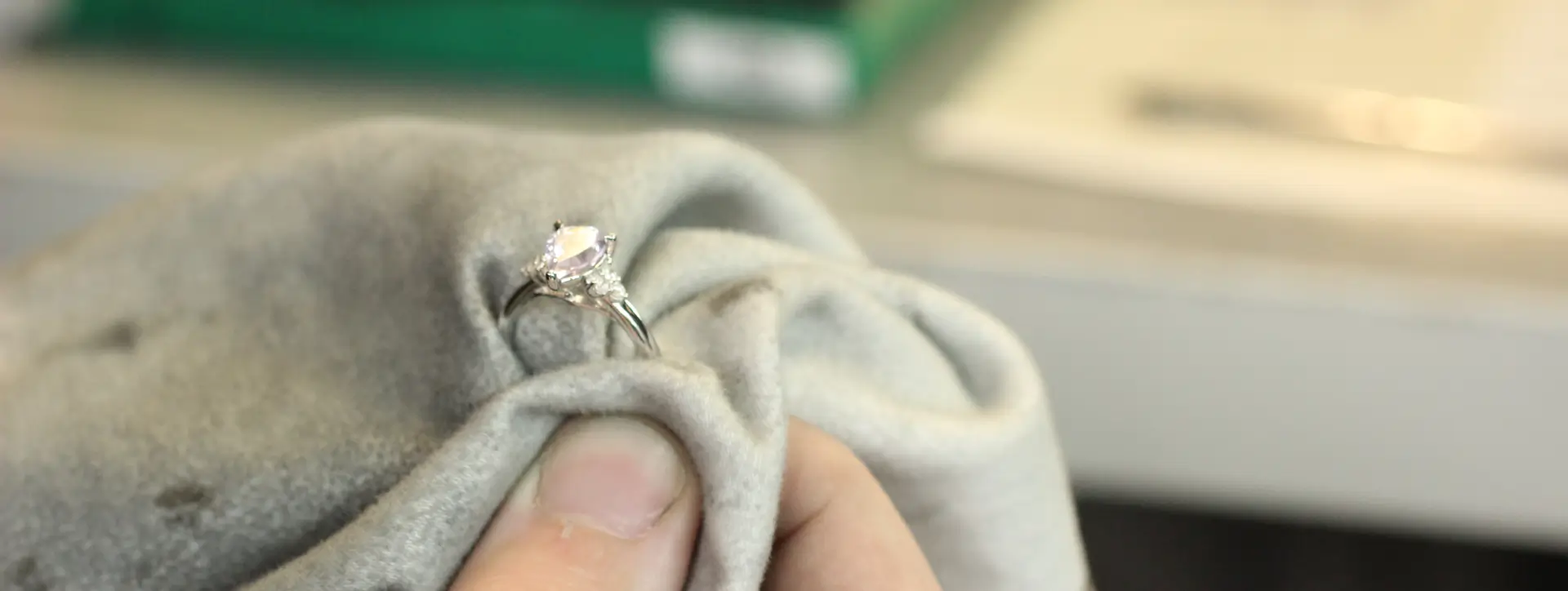 A solitaire diamond ring having the stone reset and repaired